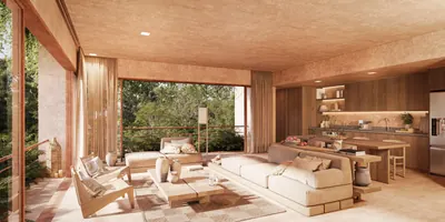Living room and kitchen with floor-to-ceiling glass overlooking tropical jungle at Aldea Kalan Bacalar