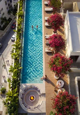 Aerial view of pool with flowers at Atzaro Residences, Playa del Carmen