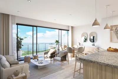 Kitchen and living area with ocean view at Aurora Towers, Cancun