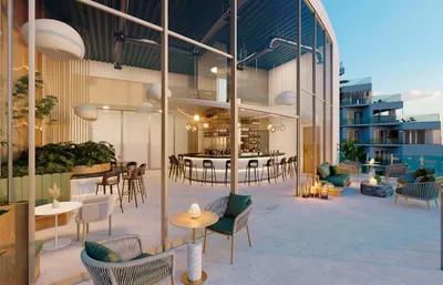 Lobby lounge with glass bar at Aurora Towers, Cancun