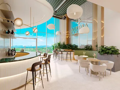 Rooftop bar with circular counter at Aurora Towers, Cancun