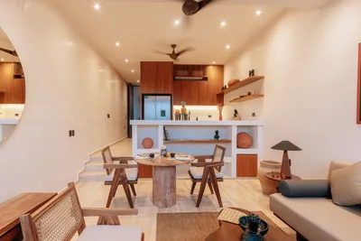 Living, dining and kitchen area at Bacab Tulum