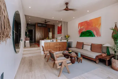 Living and dining area with mirror at Bacab Tulum
