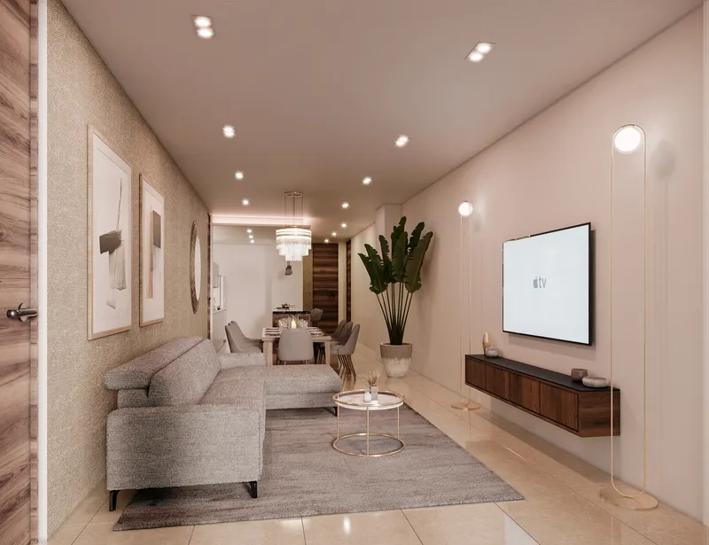 Sala con sofá y TV en distribución de concepto abierto en residencia frente al canal BLAS en Puerto Cancún