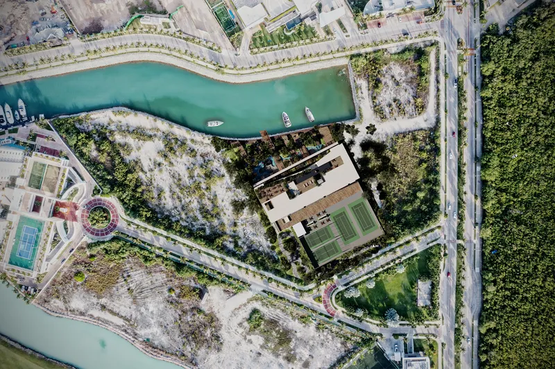 Render aéreo del plan maestro del sitio BLAS dentro de la comunidad planificada Puerto Cancún
