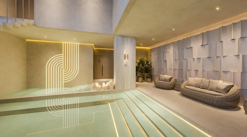 Alberca interior de spa con área de relajación en spa wellness El Estero BLAS en Puerto Cancún