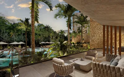 Salón de alberca con palmeras en Distrito Xcalacoco, Playa del Carmen