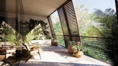 Private balcony lounge with plush seating and panoramic jungle views at Faena Tulum Résidences in Aldea Zama