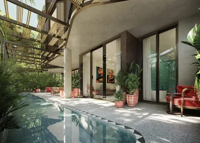 Luxury suite with indoor plunge pool and floor-to-ceiling windows overlooking the jungle at Faena Tulum