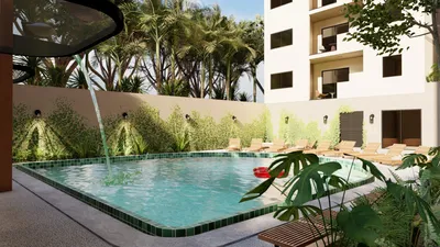 Alberca con cascada en Gobernador 28, Playa del Carmen