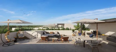Terraza rooftop lounge en Macondo Playacar, Playa del Carmen