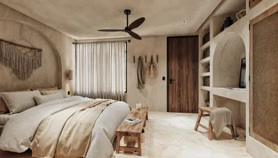 Recámara con puerta arqueada en estilo bohemio en Maia, Playa del Carmen