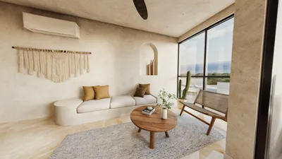 Sala con sofá y balcón en Maia, Playa del Carmen