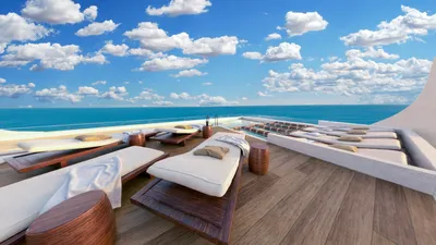 Lounge en azotea en deck con vista al océano en Maia, Playa del Carmen