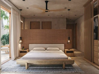 Bedroom with balcony access, wood wardrobe, and natural materials at Maranta Tulum