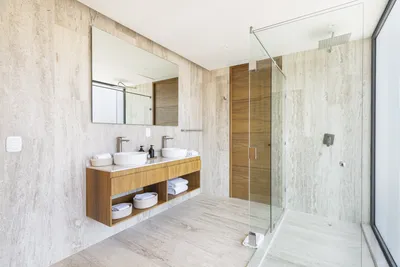Bathroom with double vanity and shower at Mistiq Villas, Tulum