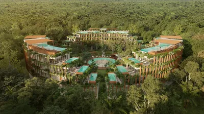 Aerial view of circular rooftop pools at Mistiq Temple, Tulum