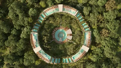 Aerial overhead view of circular turquoise pool at Mistiq Temple, Tulum