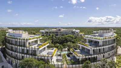 Aerial view of semicircular rooftop gardens at Mistiq Temple, Tulum