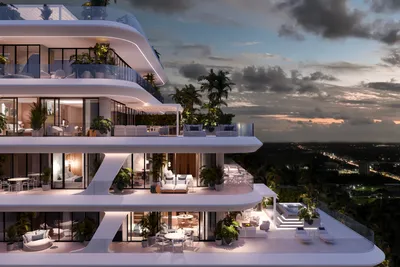 Curved balconies at sunset at Nautica Residences, Cancun