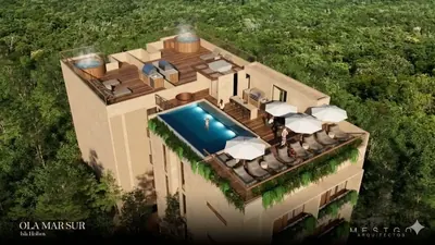 Rooftop pool with aerial lounge area at Olamar Sur, Holbox
