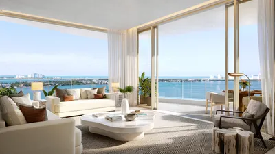 Living room with lagoon view at One Laguna, Cancun