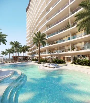 Pool with curved tower at One Laguna, Cancun