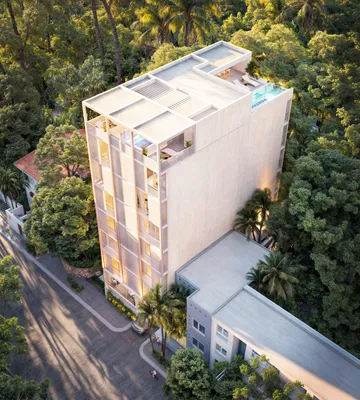 Vista aérea del edificio y rooftop en Portha, Playa del Carmen