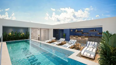 Alberca infinita en rooftop con lounge en Portha, Playa del Carmen