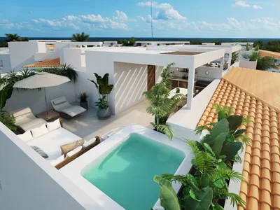 Alberca en azotea y terraza en Puerto Aqua, Puerto Aventuras