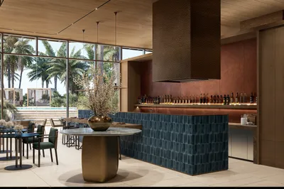 Kitchen bar with blue tile accents at SLS Ocean Beach Residences, Puerto Cancun