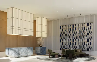 Lobby reception with marble finishes at SLS Ocean Beach Residences, Puerto Cancun
