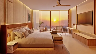 Bedroom with sunset and balcony view at The Residences at The St. Regis Costa Mujeres