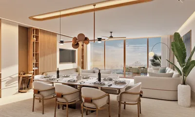 Dining and living area with ocean view at The Residences at The St. Regis Costa Mujeres