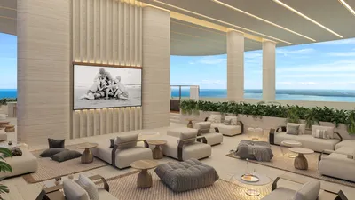 Living lobby with sofas overlooking ocean at The Residences at The St. Regis Costa Mujeres