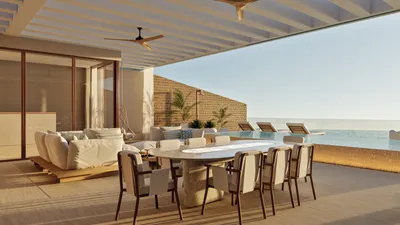 Terrace dining with ocean view at The Residences at The St. Regis Costa Mujeres