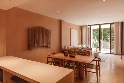 Comedor con balcón en The Village Resort & Residences en Corasol, Playa del Carmen
