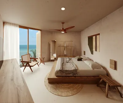 Bedroom with ocean view and balcony at TOK Holbox