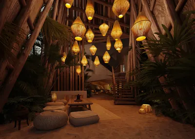 Lounge with hanging lanterns and bamboo accents at TOK Holbox