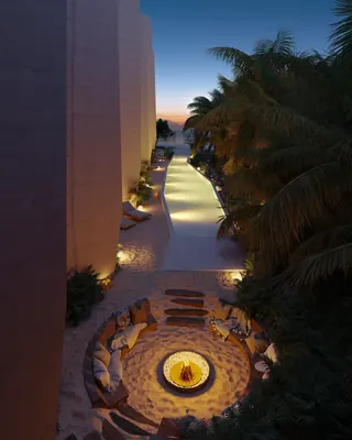Night aerial view of courtyard with fire pit at TOK Holbox