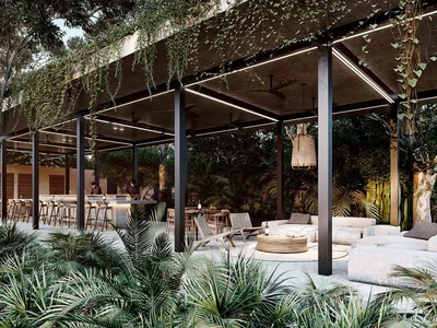 Rooftop canopy daybed terrace with jungle views at Tree60 villa, designed for outdoor living in Tulum