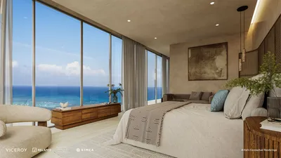 Recámara con suite y vista al océano en Viceroy Residences Playa del Carmen