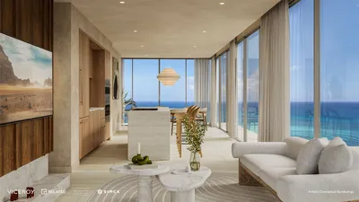 Sala y comedor con vista al océano en Viceroy Residences Playa del Carmen