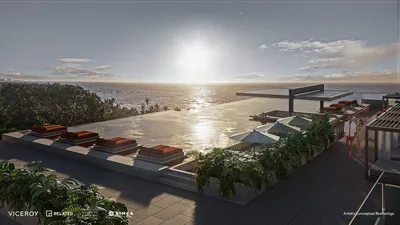 Alberca en rooftop al atardecer en Viceroy Residences Playa del Carmen