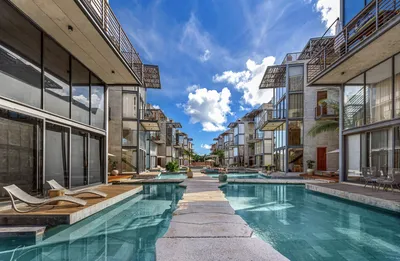 Canal pool with residences at Xalet Tulum