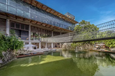 Lagoon bridge connecting residences at Xalet Tulum