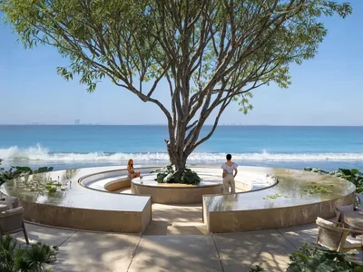 Terraza frente al mar con árbol y vista al océano en ZONNA N.01, Playa del Carmen